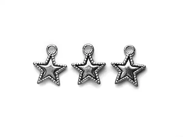 DIJE METALICO NIQUEL ESTRELLA 1CM X 1CM X 50GRS 67UN APROX