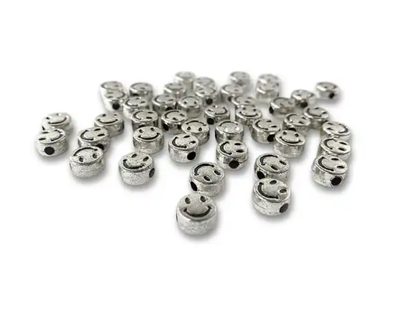CUENTAS DE PLASTICO CARITAS 9MM X 125GRS