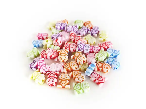 CUENTAS DE PLASTICO RANITAS 7MM X 10MM X 125GRS
