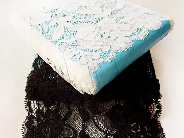 PUNTILLA LYCRA LIRIO BLANCA - NEGRA 17,5CM X 10MT